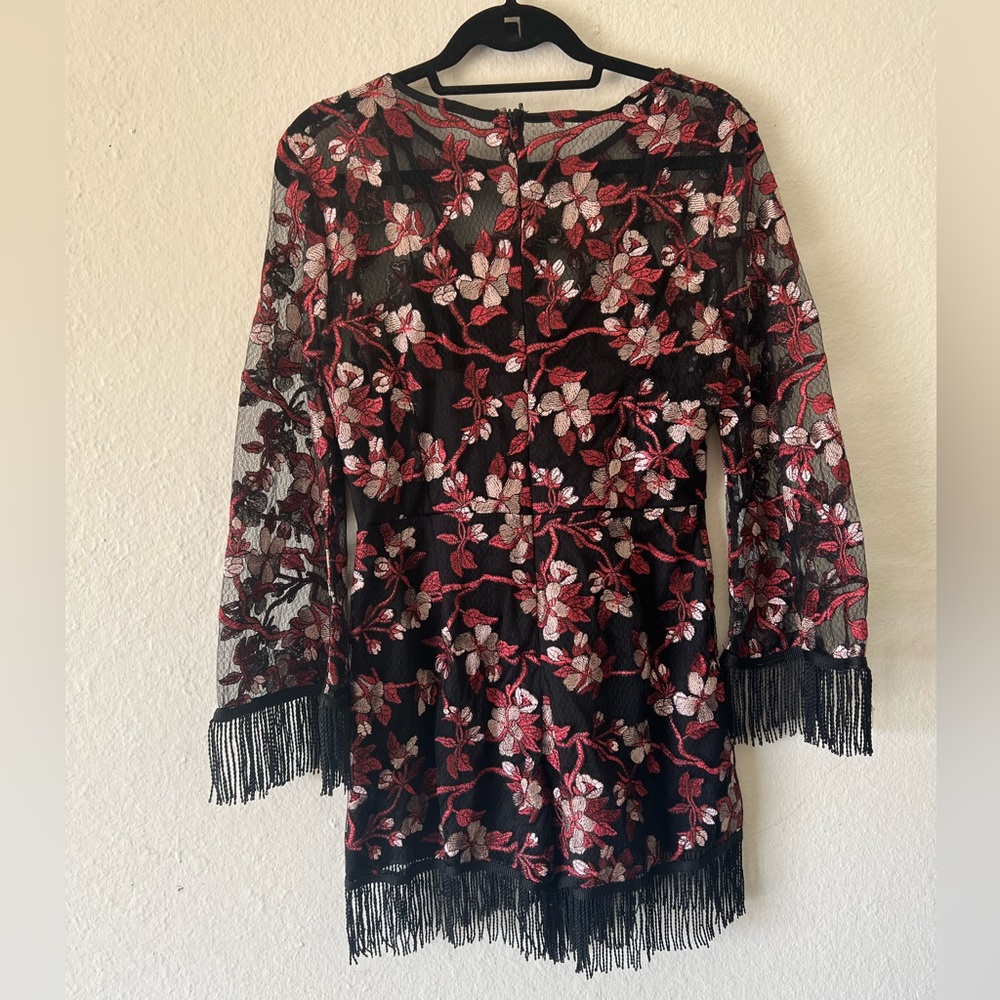 Floral Lace Romper with attached cover underneath. Fits size 8 or 10
